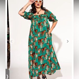 Lala Tiger smocked dress size medium. Worn once, not my style